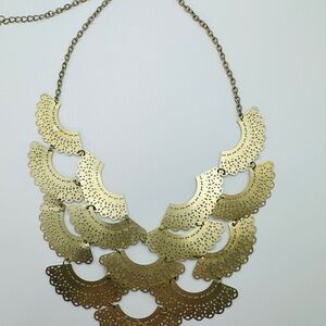 Unique Gold-tone Statement Necklace.
Flexible and reversible.